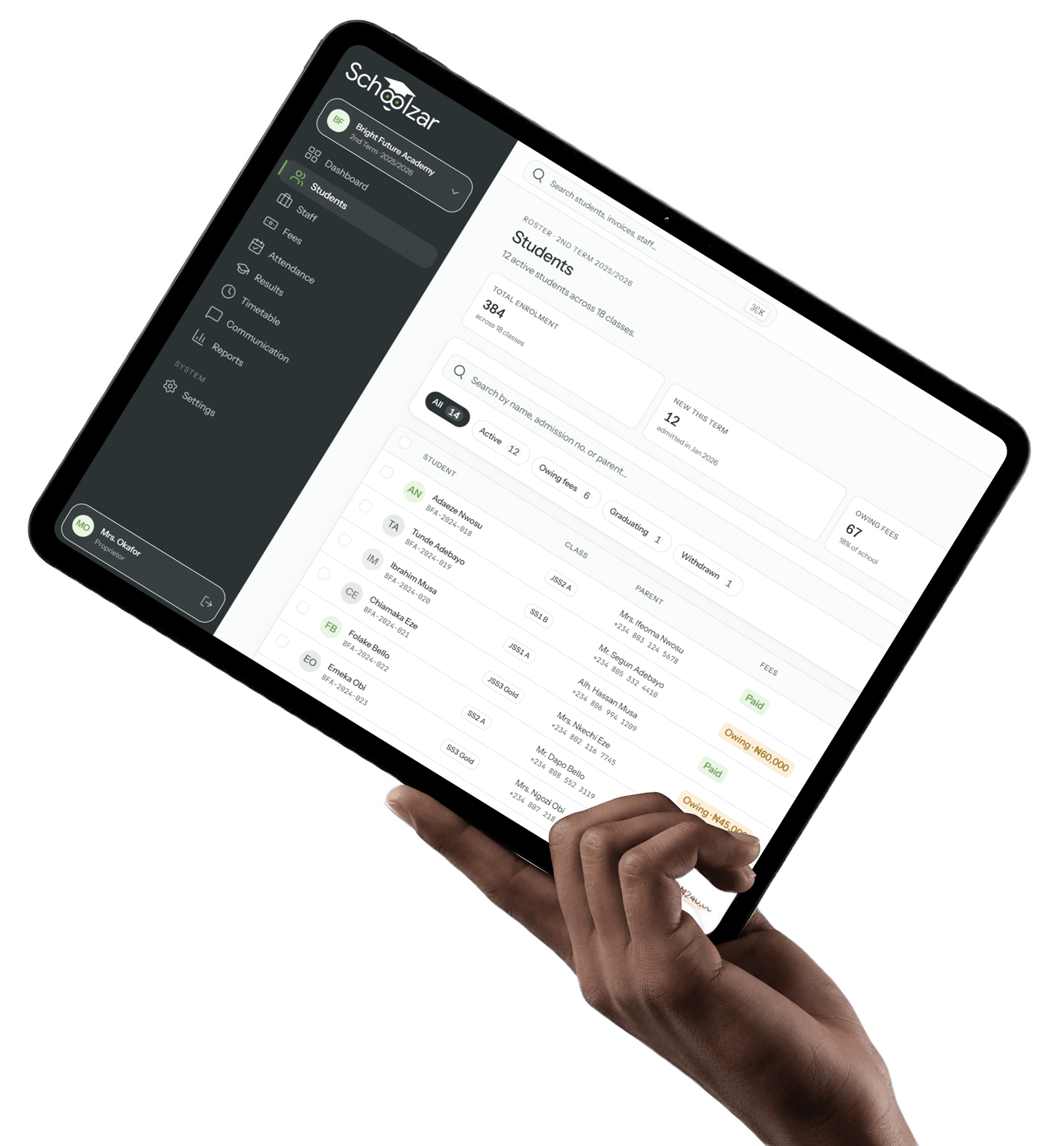 A hand holding a tablet showing the Schoolzar student roster — 384 enrolled across 18 classes, with class, parent and fee status per student
